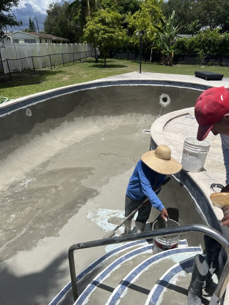 guy-repairing-pool