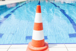 Swimming Pool Repairs: Pool With an Orange Cone in Front