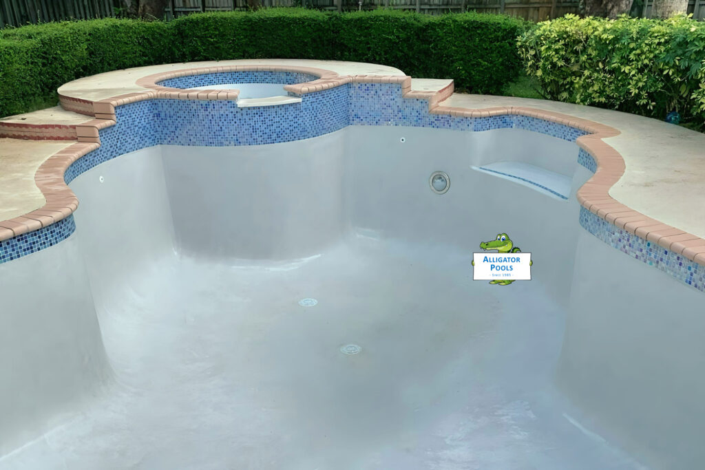 pool resurfacing with new pool tile and company logo