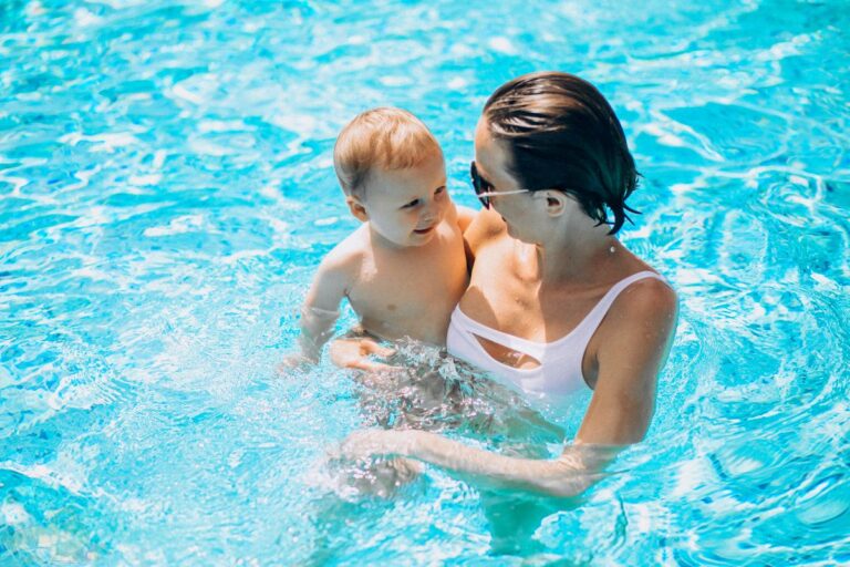 young-mother-with-little-son-in-pool